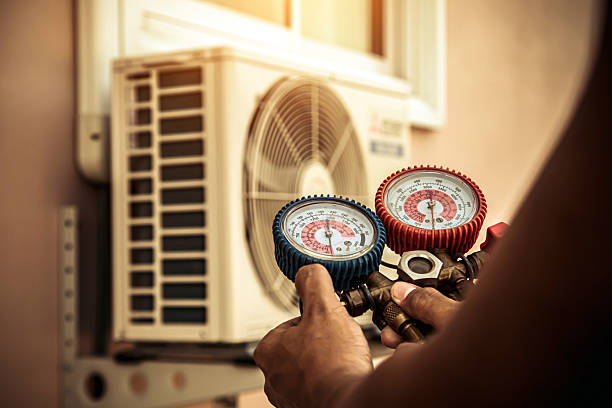 Professional Hvac technician working in Auburn University, AL